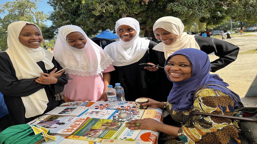At the UN  information table, Young people in Zanzibar, receive SRHR information during the commemoration of IYD in Zanzibar. Ph