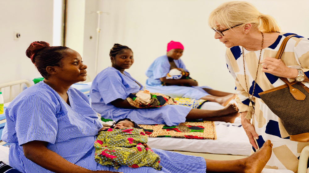 Finland Ambassador Her excellency Riita Swain, speaking with the new born mothers at Amana Referal Hospital, Ilala Dar Es Salaam